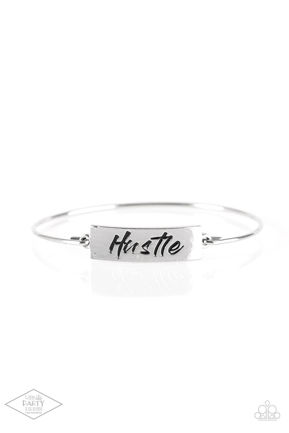 Engraved with the inspiring word "Hustle", a shimmery silver plate attaches to a skinny silver bar, creating a dainty bangle.