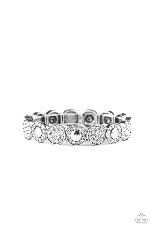 Paparazzi Encrusted in dainty white rhinestones, mismatched silver frames are threaded along stretchy bands around the wrist for a sparkly look.